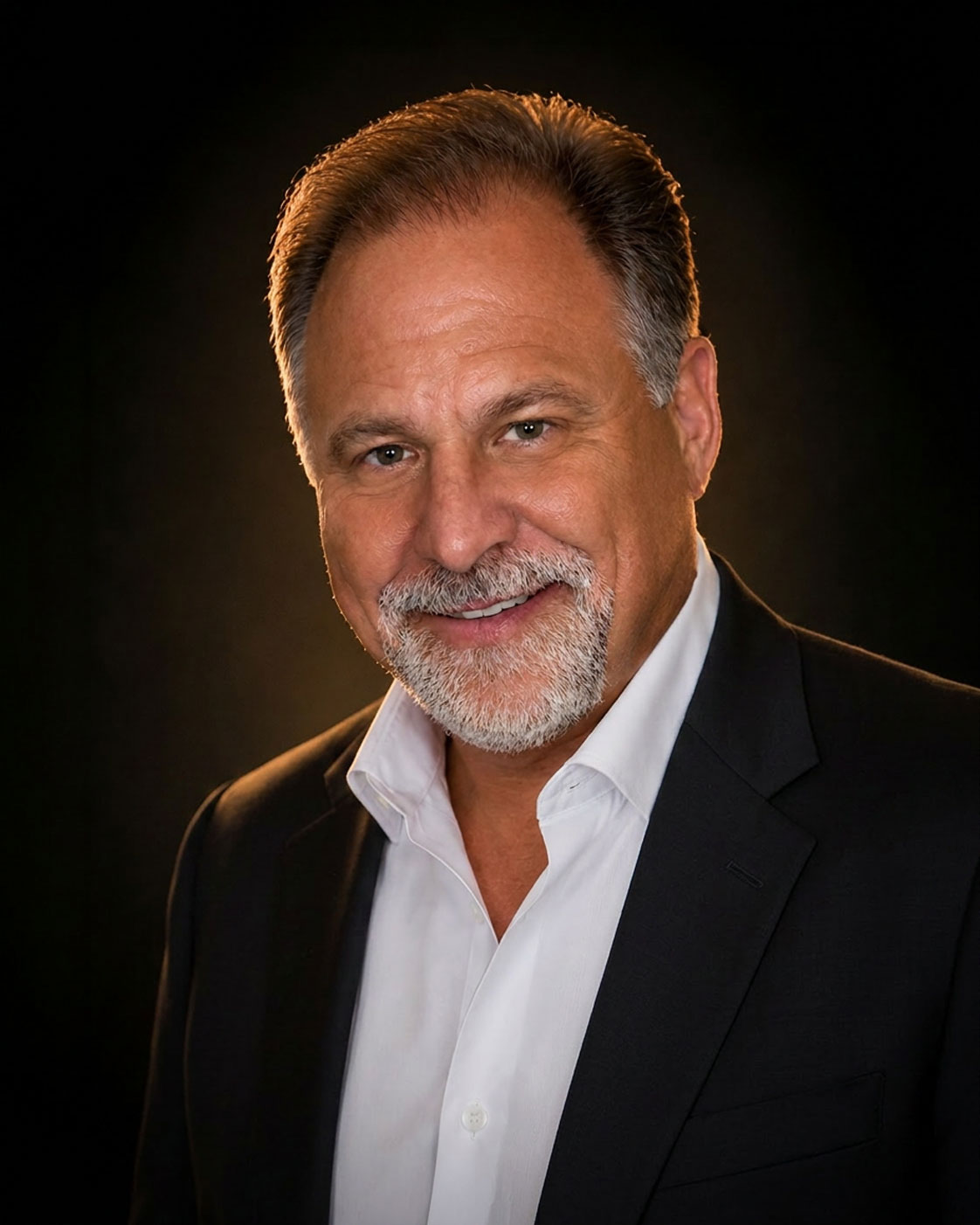 John D. Reighard — CEO
